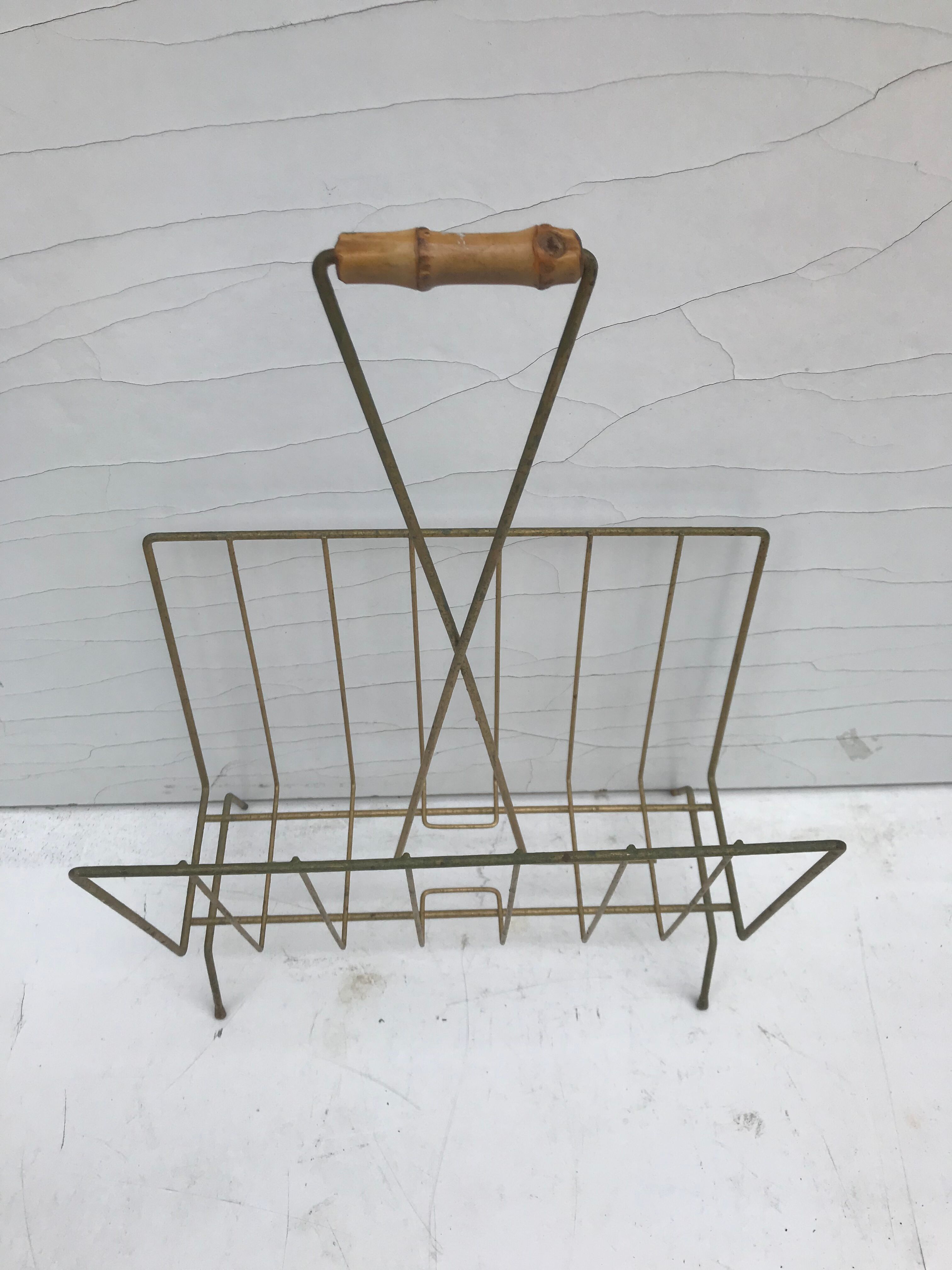 Magazine holder in golden metal and its handle is in bamboo, 1960 vintage