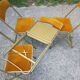Série de 4 chaises pliantes métal doré et tissus