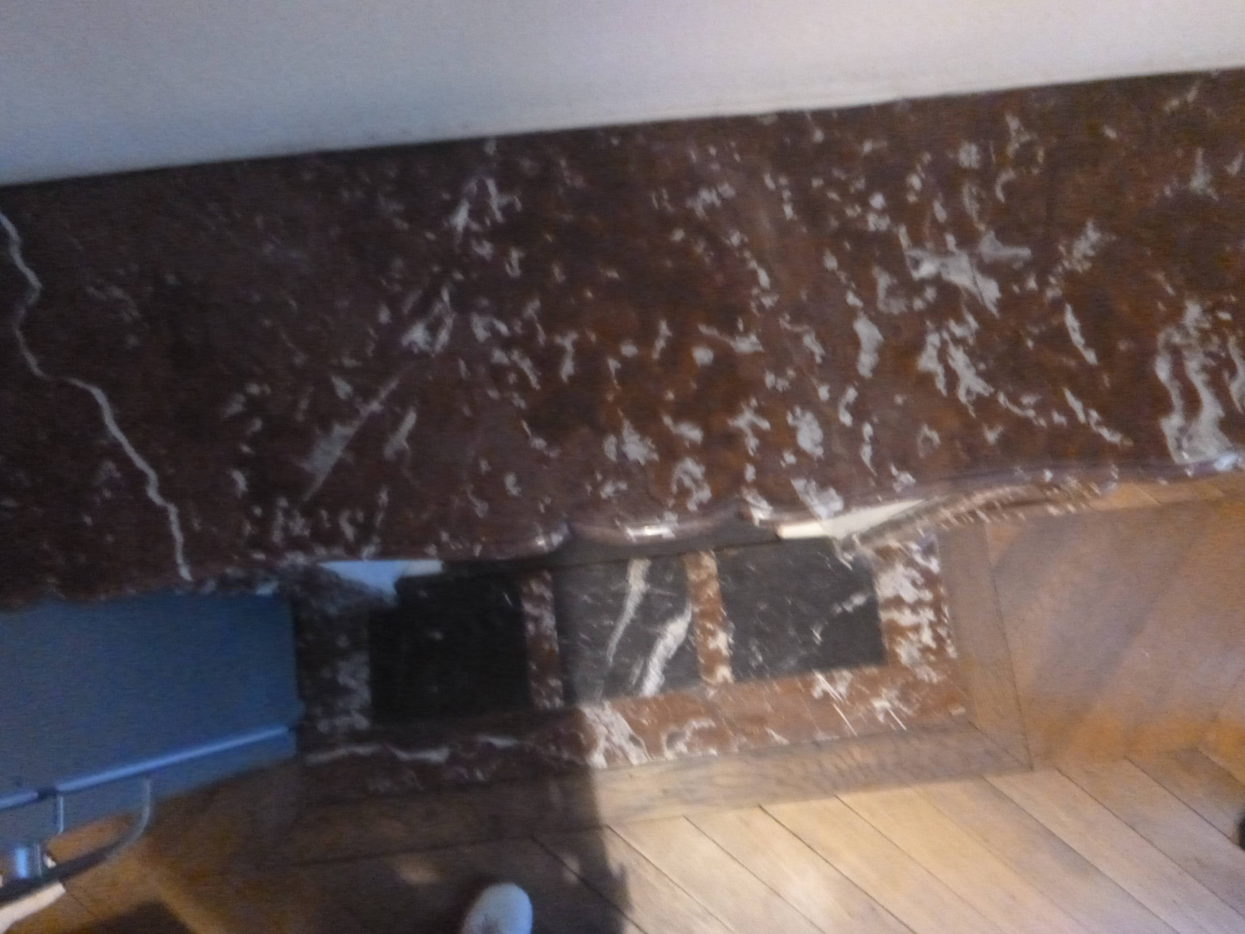 Red marble fireplace