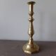 Old candle holder in gilded bronze