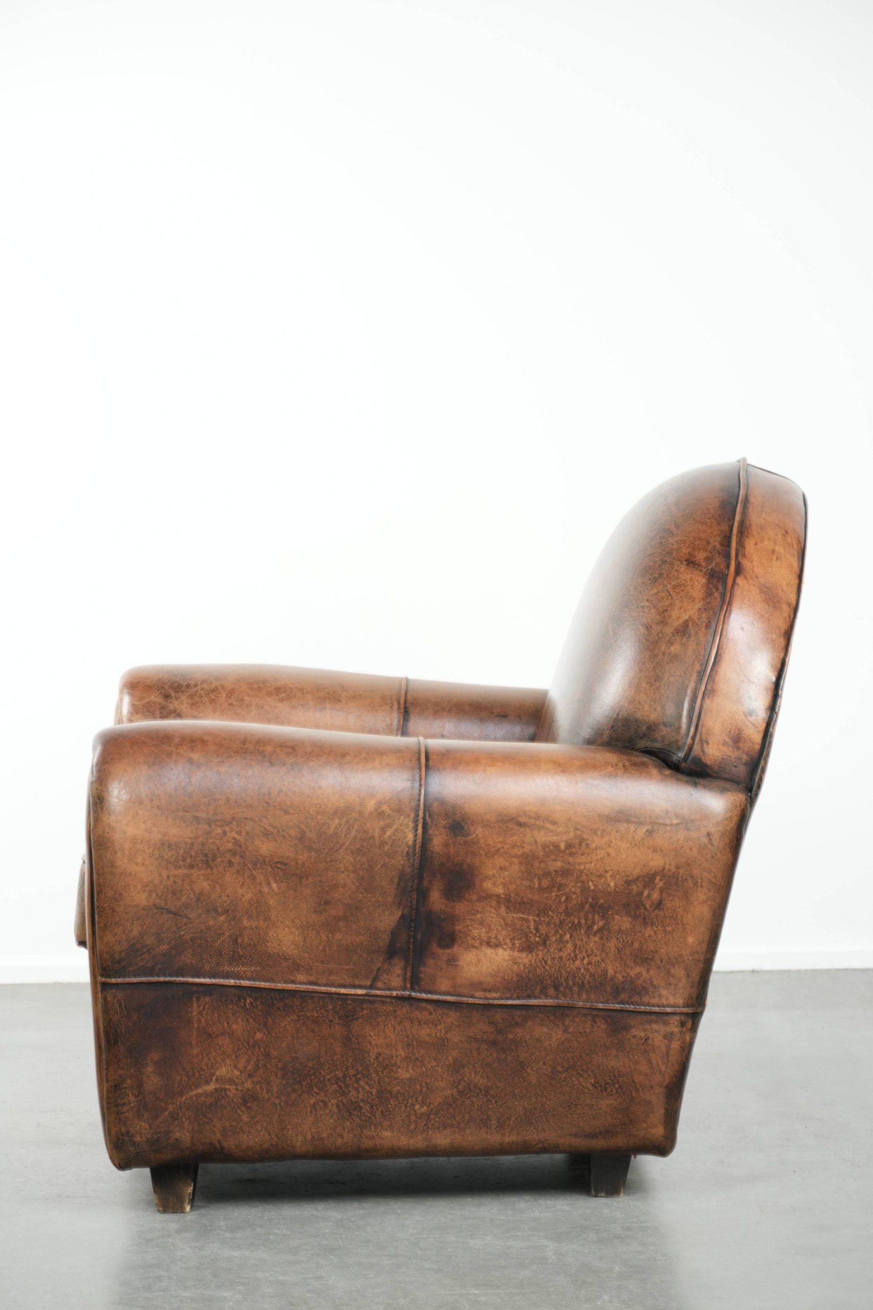 Armchair made of sheepskin leather in Art Deco design with beautiful patina