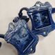 Pair of 1910 art nouveau period coat hooks in blue enameled cast iron