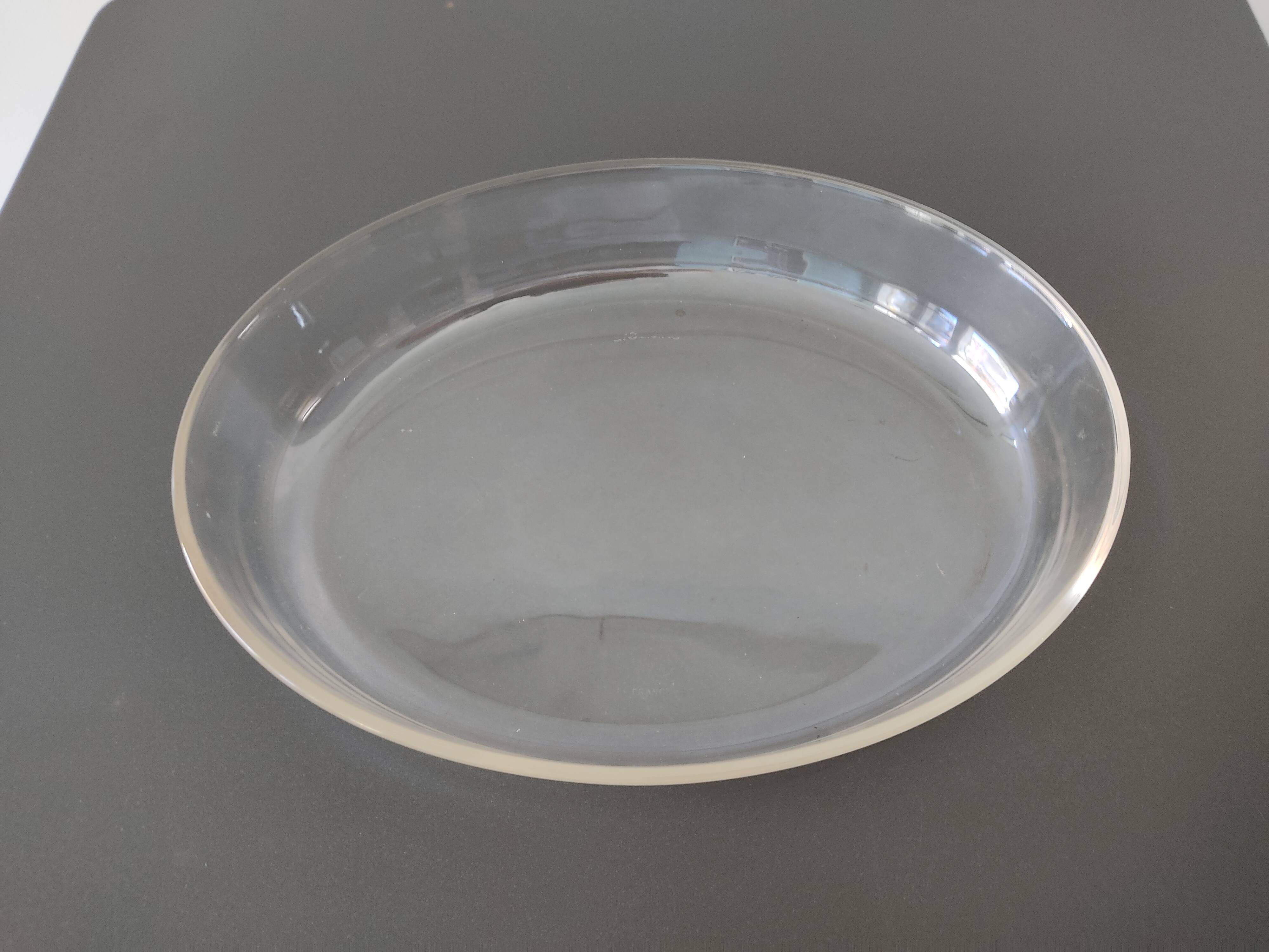 2 glass dishes with silvered steel frames from the 1960s, very good quality.