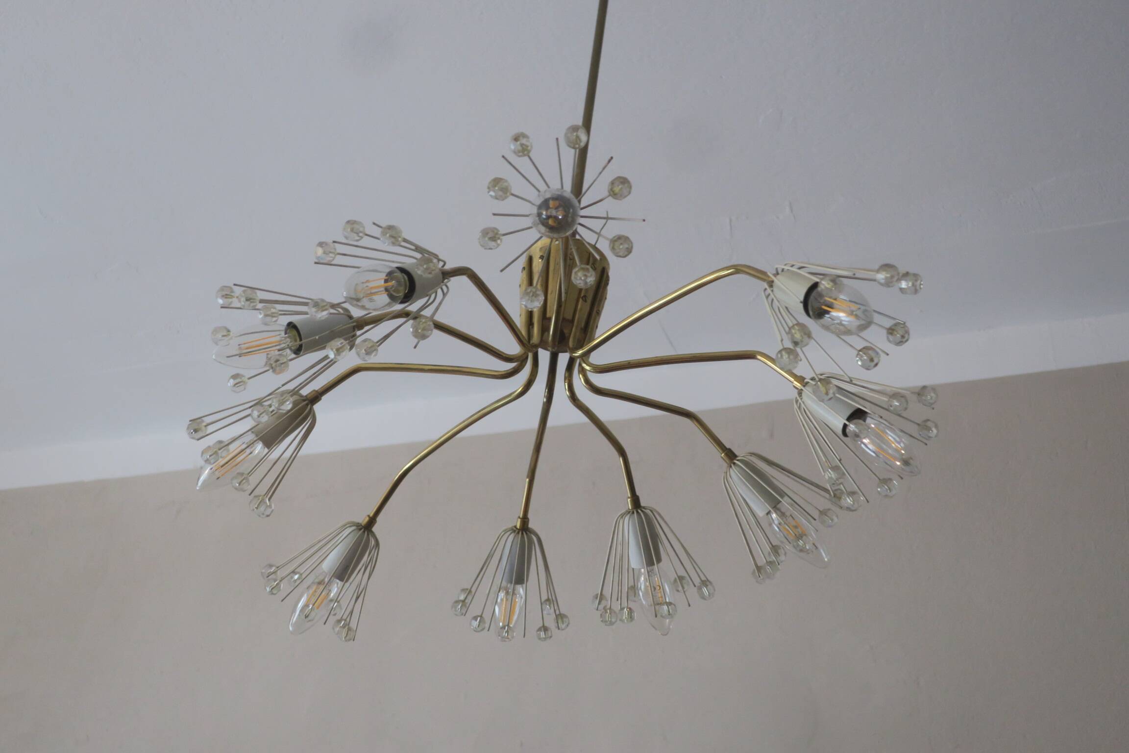 Elliptical brass and glass 10-arm chandelier, 1950s