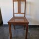 Wooden and cane chair. Carved wooden chair with cane seat.