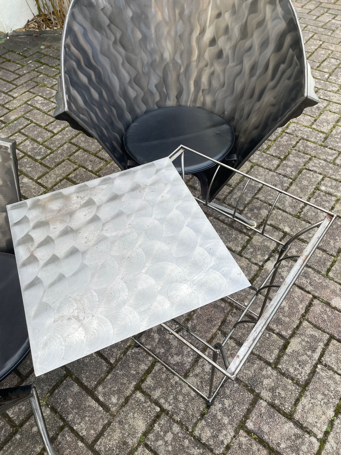 2 cone chairs and a table by Steel-Line