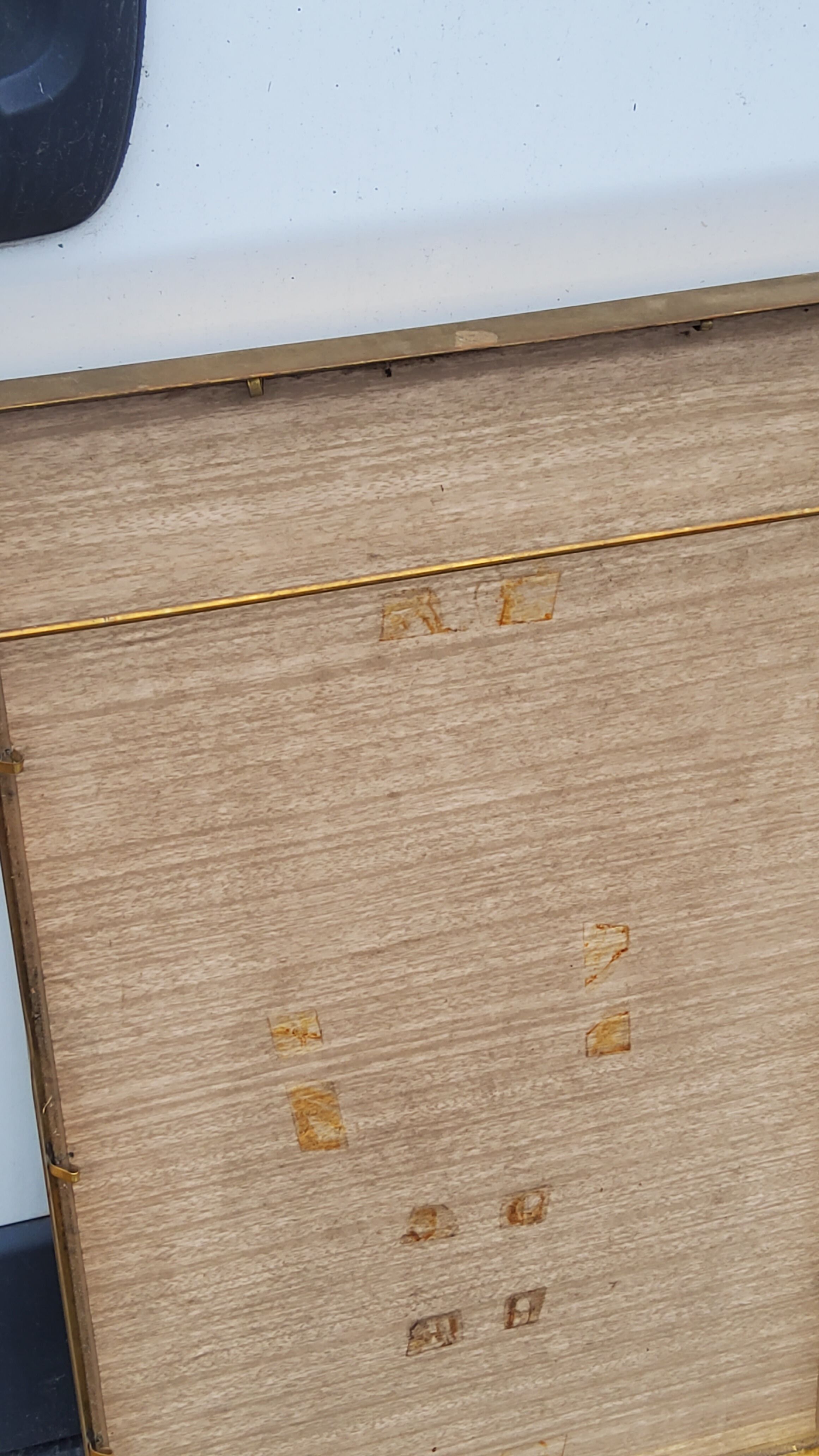 Mirror of the 70s in gilded metal, 60x35 cm