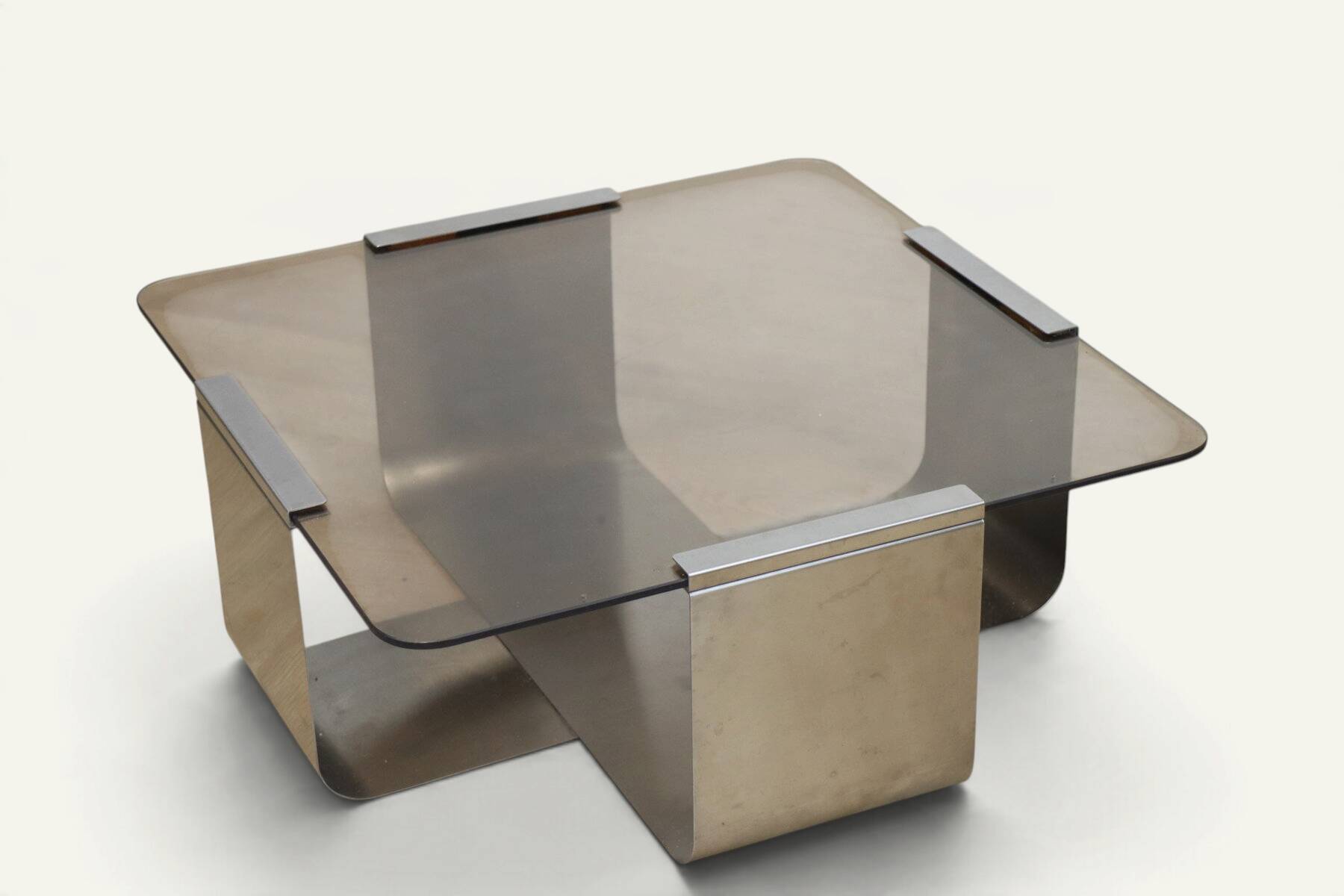 Brushed steel and smoked glass coffee table, by François Monnet – 1970s