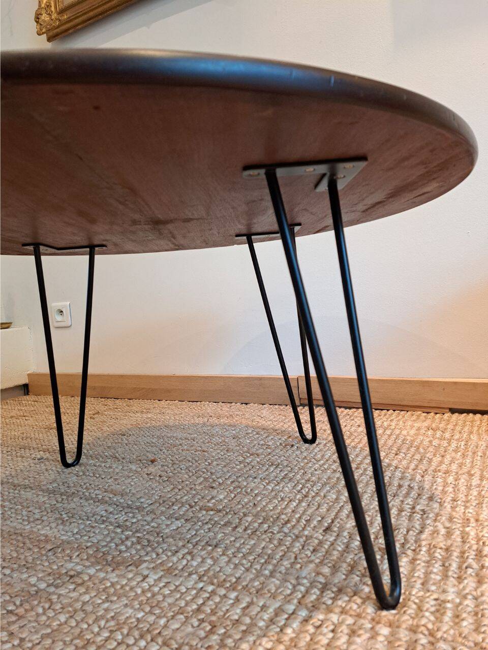 Round coffee table with mahogany wood top
