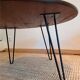 Round coffee table with mahogany wood top