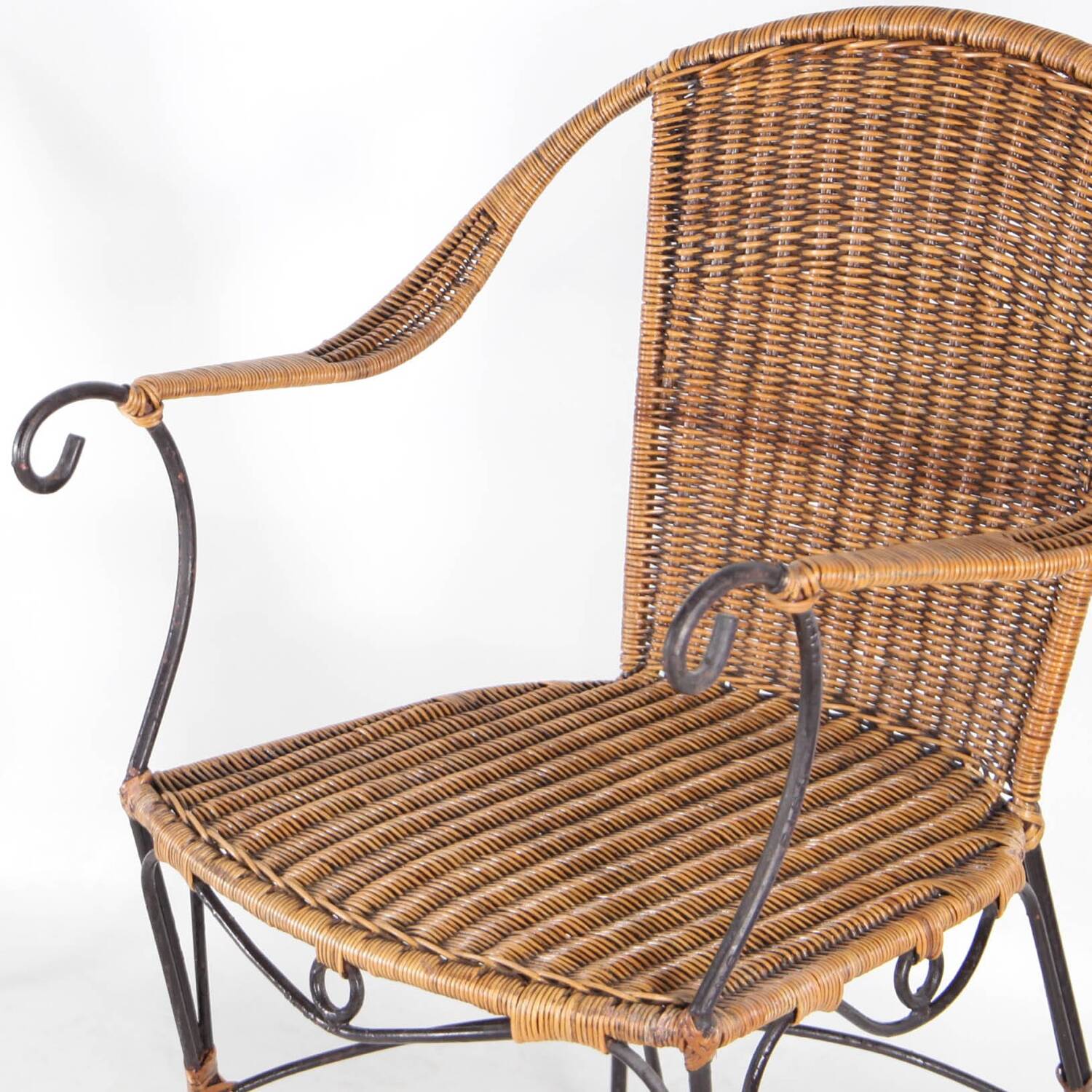Pair of wicker and iron armchairs
