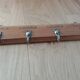 Tea towel holder, wooden and metal towel hook.