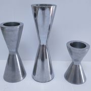 three "diabolo" aluminium design candle holders 90