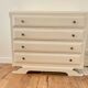 Vintage commode with moustache legs