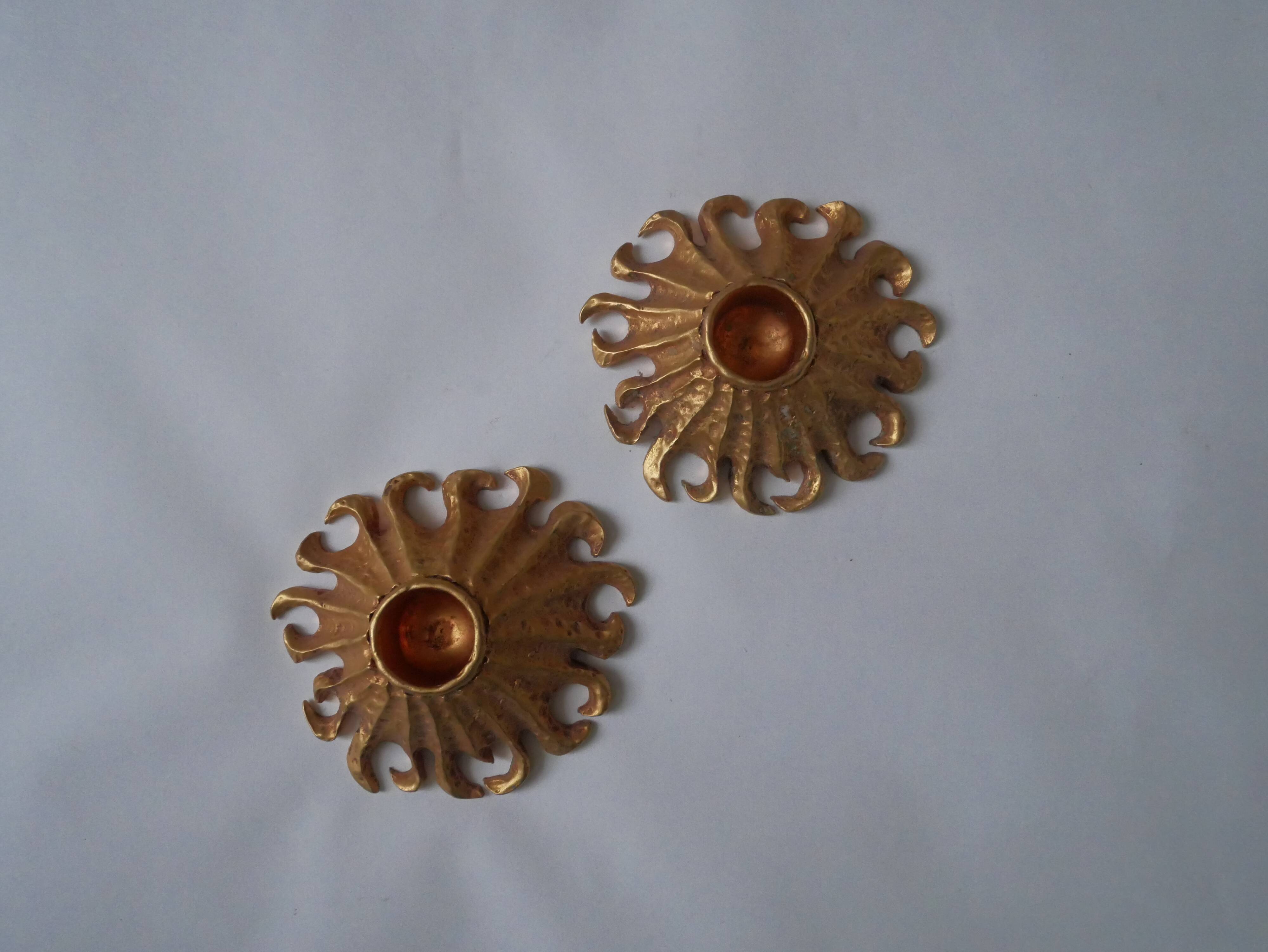 Pair of gold metal candle holders