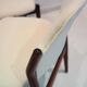 Set of six hardwood chairs by Arne Vodder for Sibast with white textile upholstery.