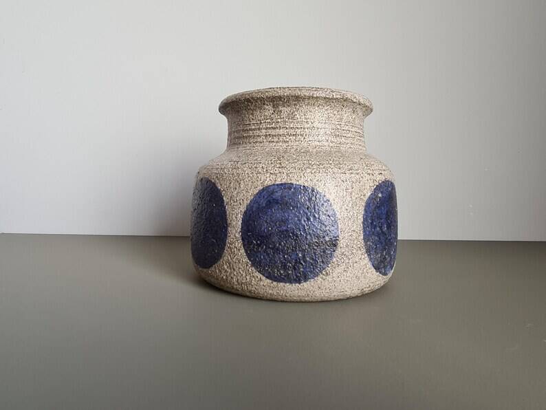 Mid-century modern stoneware vase with cobalt blue dots.