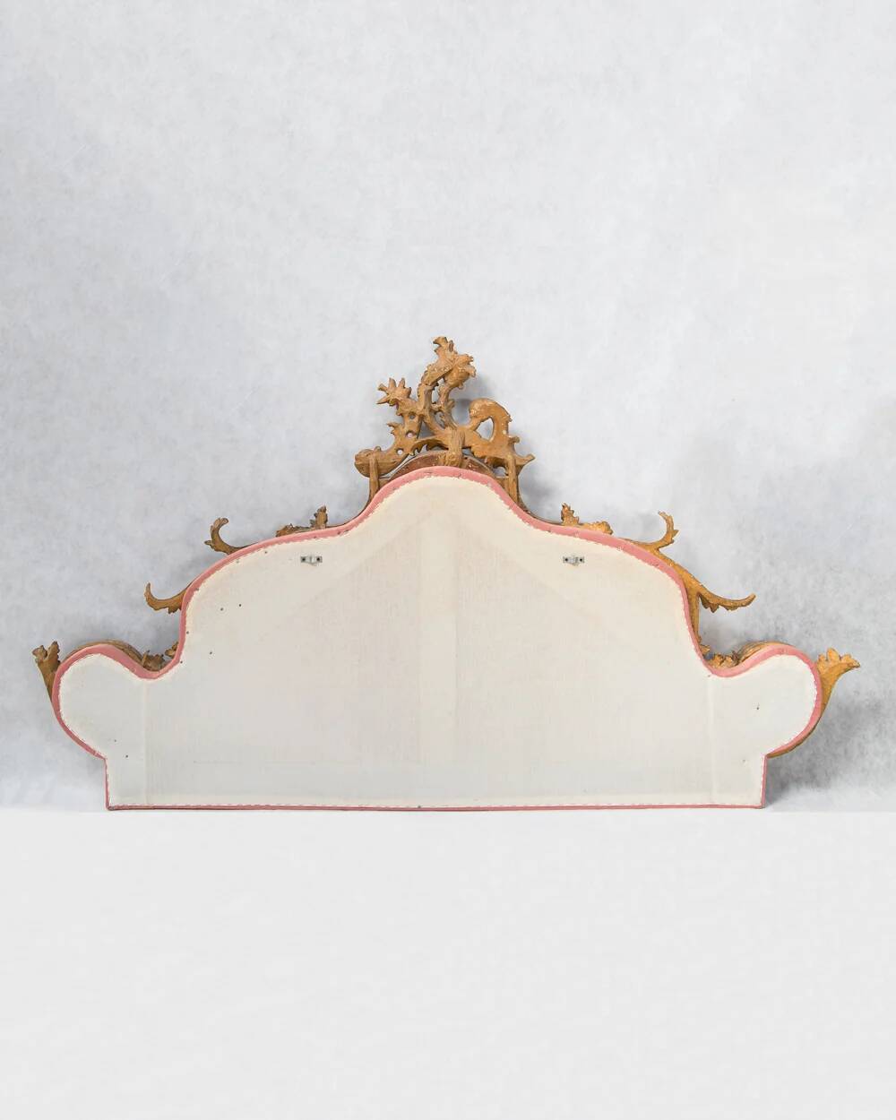 Italian rococo-style headboard in carved gilded wood, 19th century.