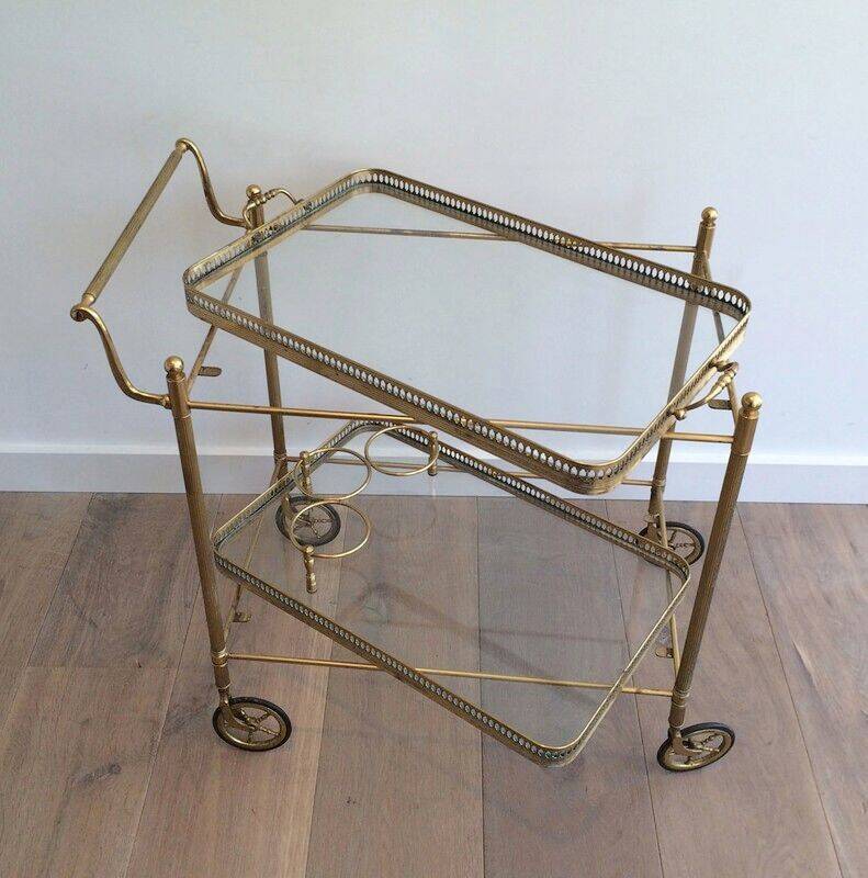 Neoclassical brass trolley with removable trays.