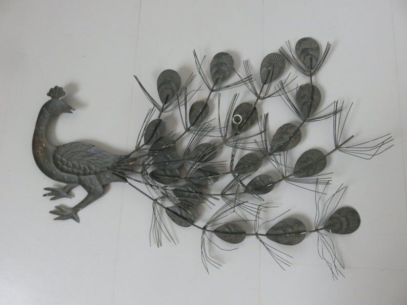 Pair of metal peacocks stamped 60s