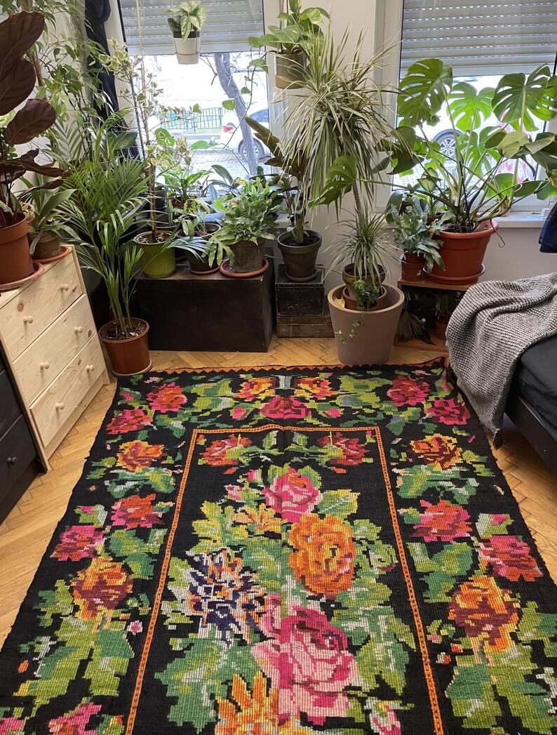 Floral handwoven carpet, colors on a black background - 262x160cm