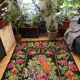 Floral handwoven carpet, colors on a black background - 262x160cm