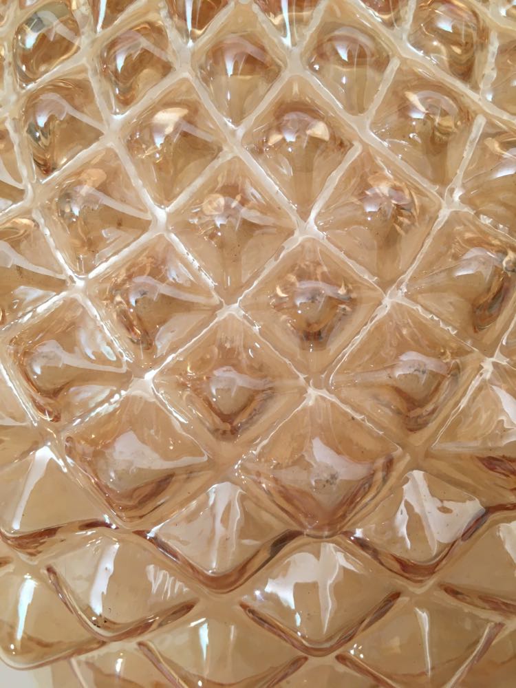 Large ceiling lamp in amber chiseled glass. Round shape