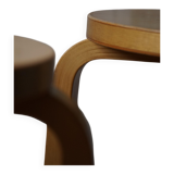 Alvar Aalto, a pair of vintage birch stools, model "60", made by Artek, 1970s.