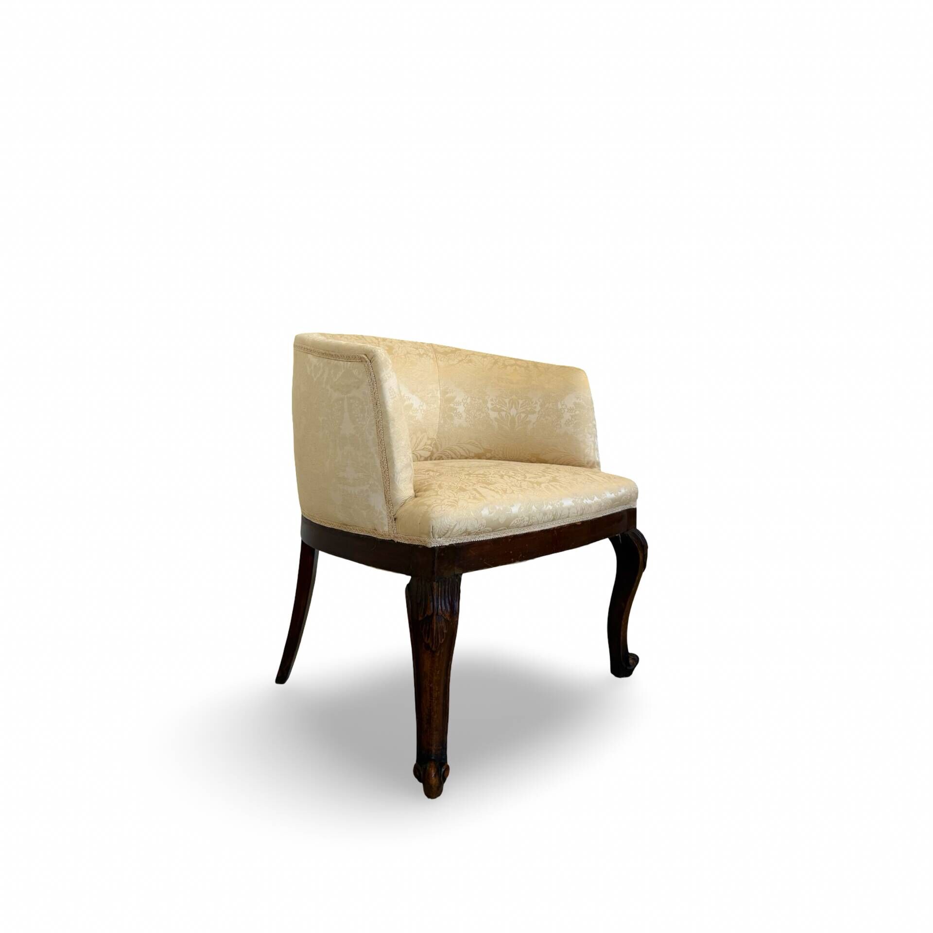 An antique Italian bar chair and a matching tufted vanity stool.
