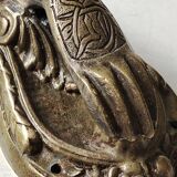Door knocker in bronze