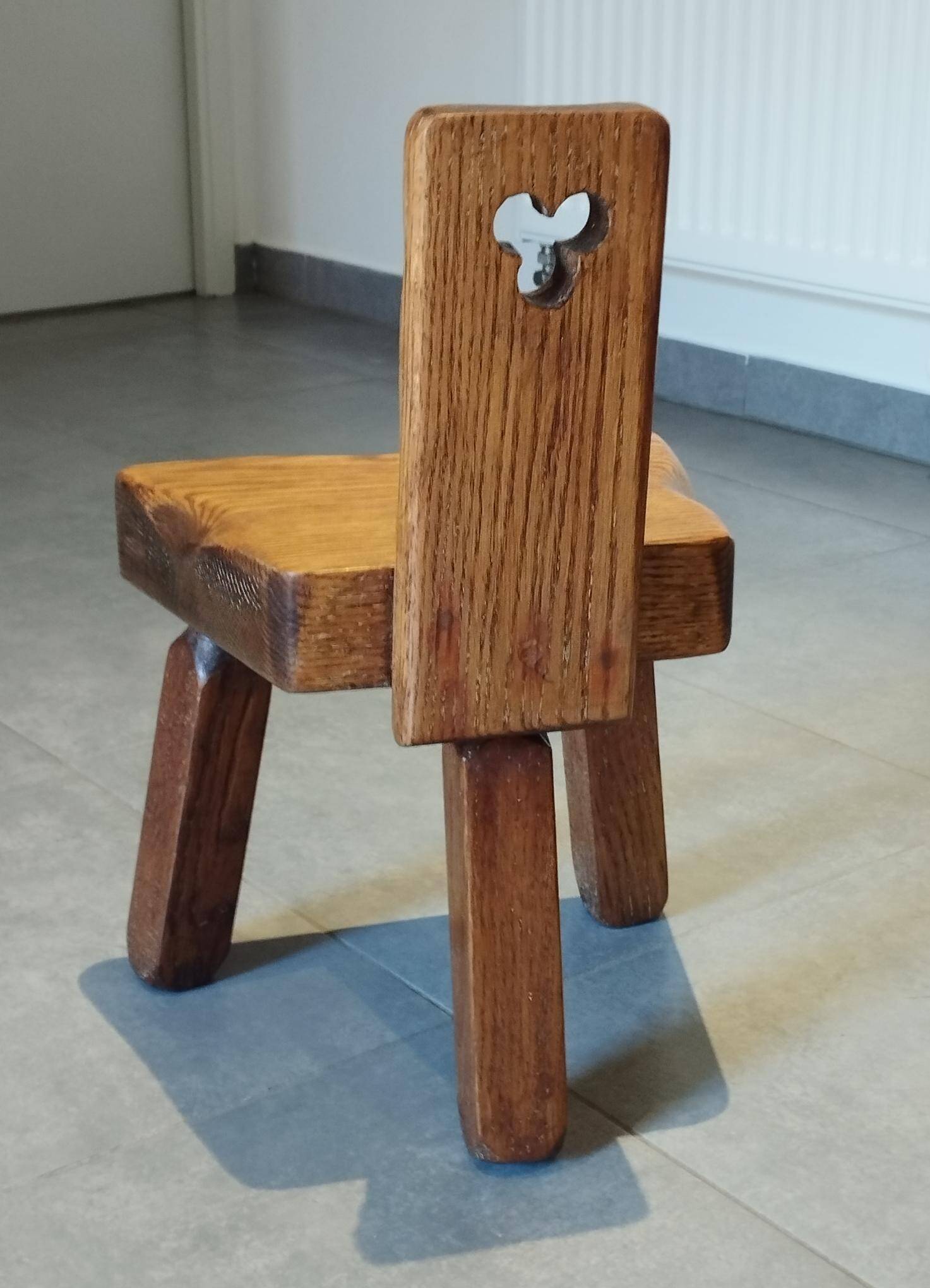 Tripod chair for children, Scandinavian brutalist chalet design.
