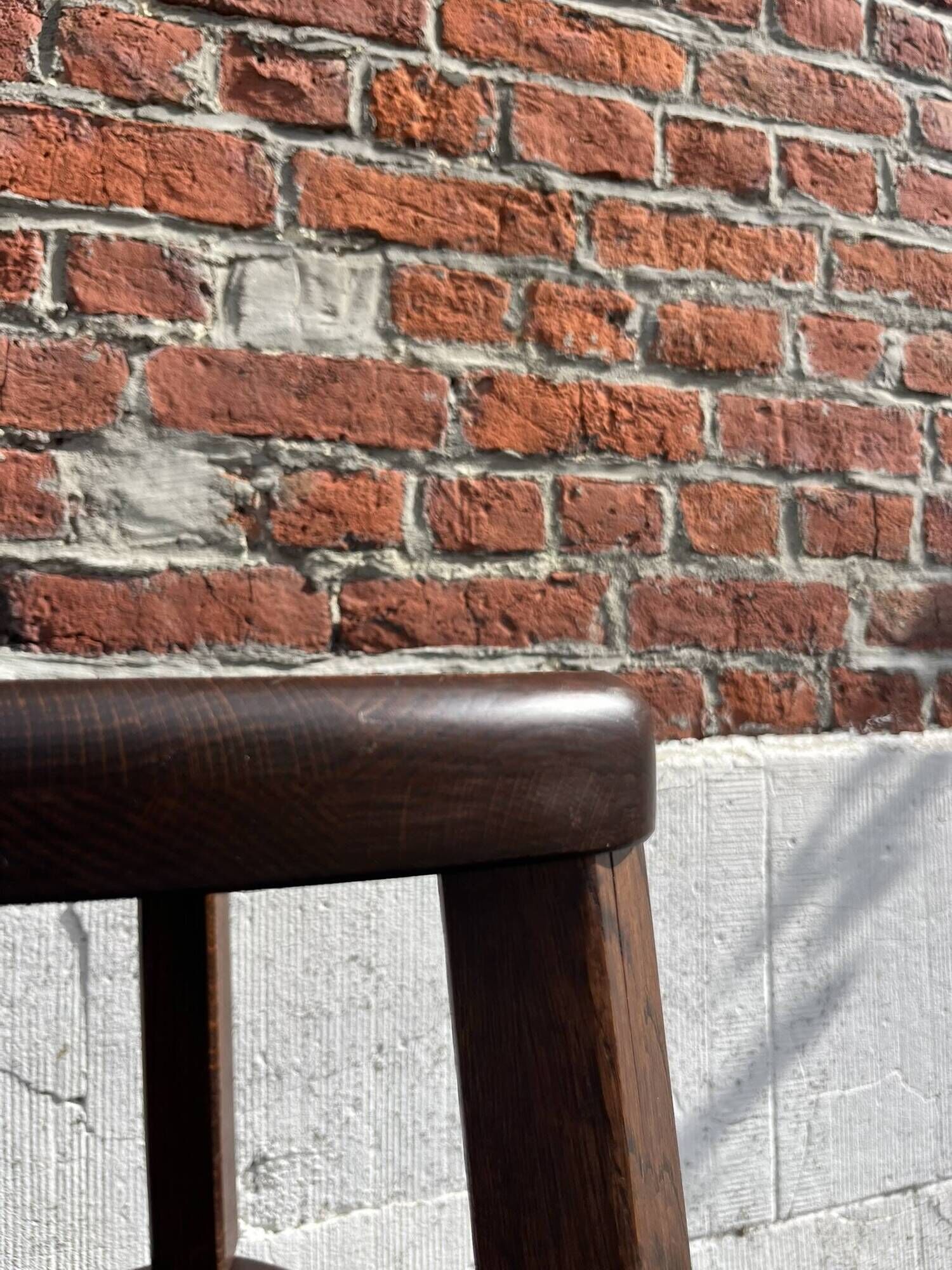 Nested tripod tables made of solid wood, in a modernist brutalist style.