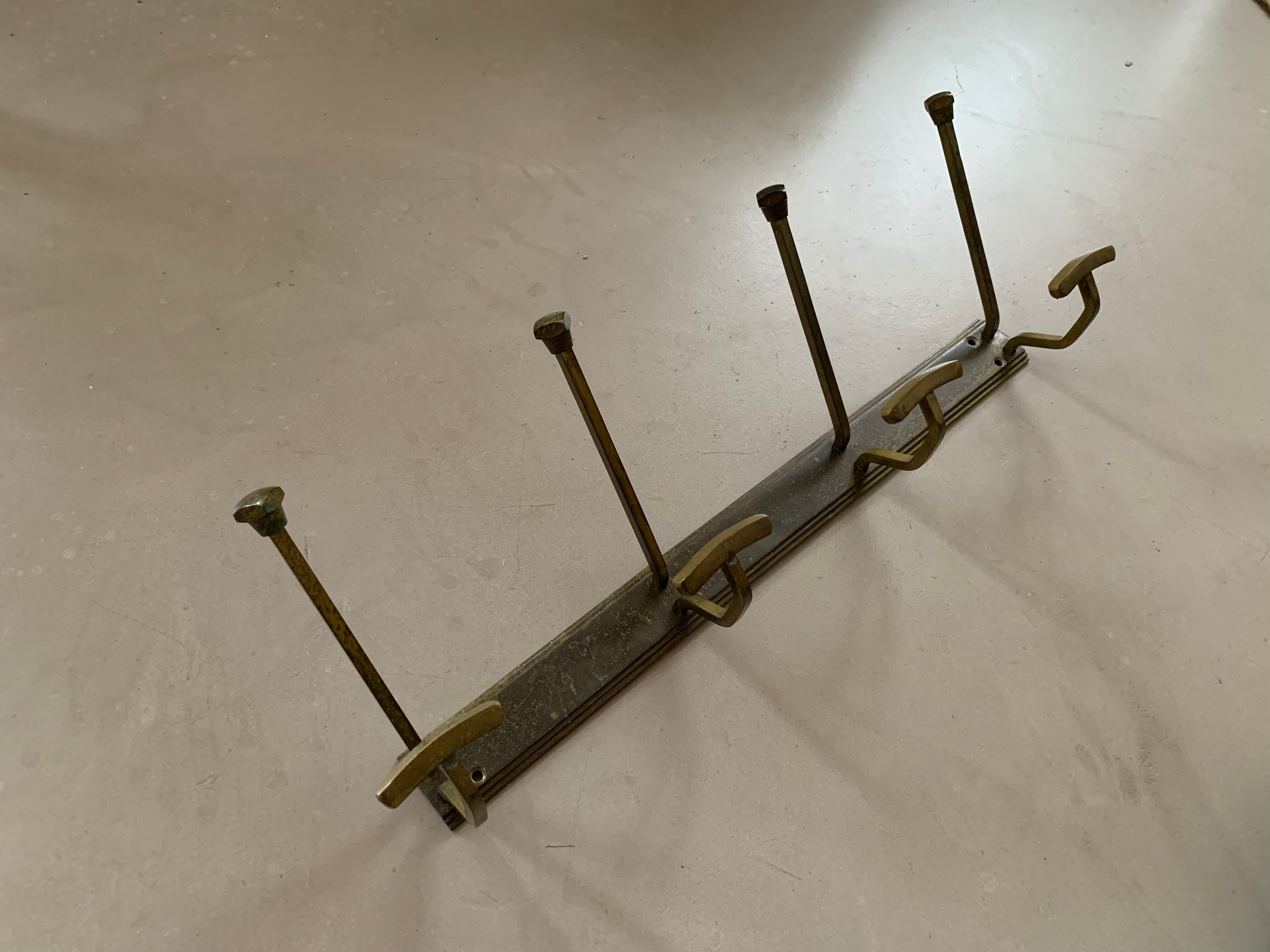 Antique brass wall coat rack