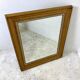 Louis XVI style wood and gilded stucco mirror