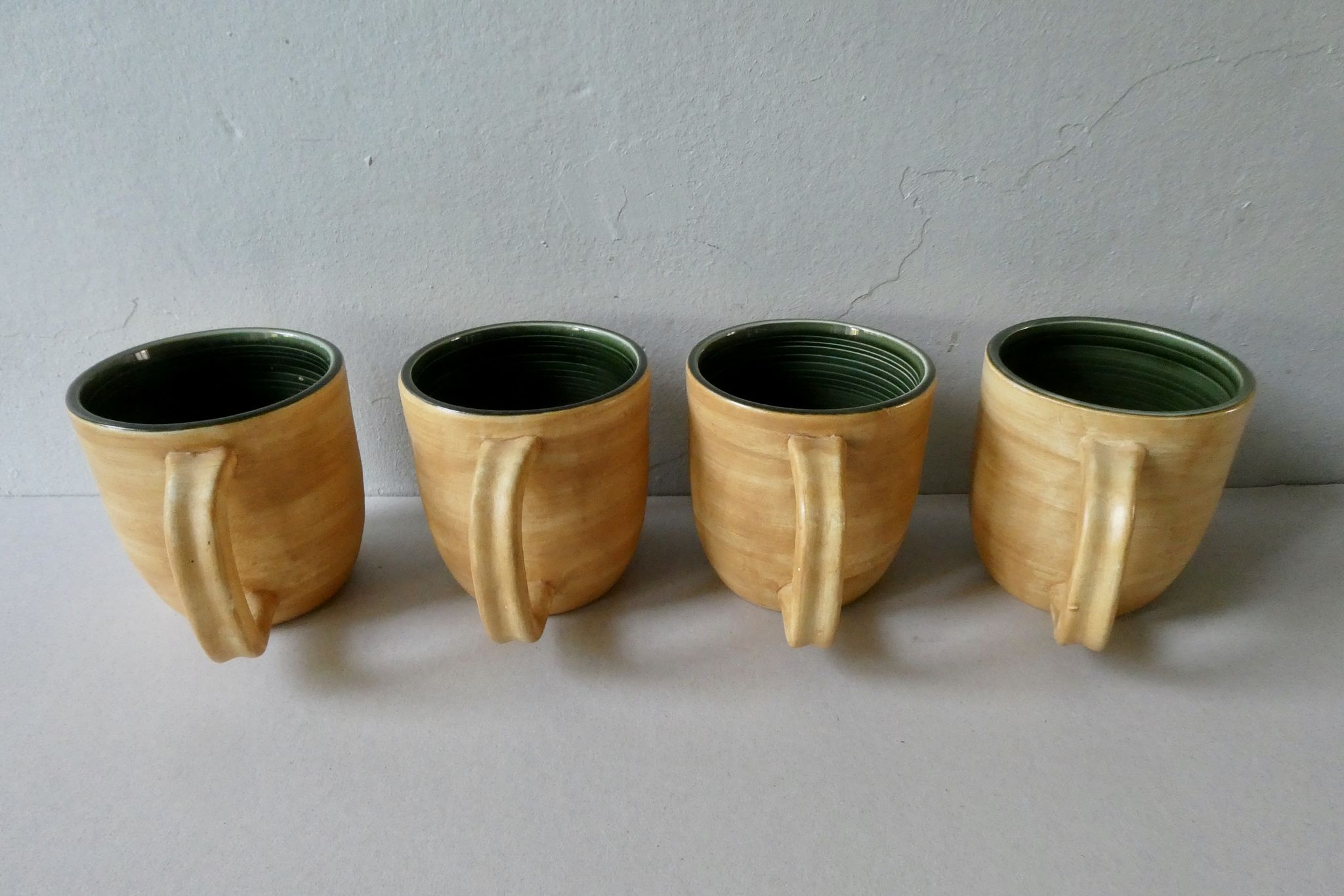 4 mugs Salins France, grès et émail vert