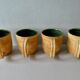 4 mugs Salins France, grès et émail vert