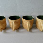 4 mugs Salins France, grès et émail vert