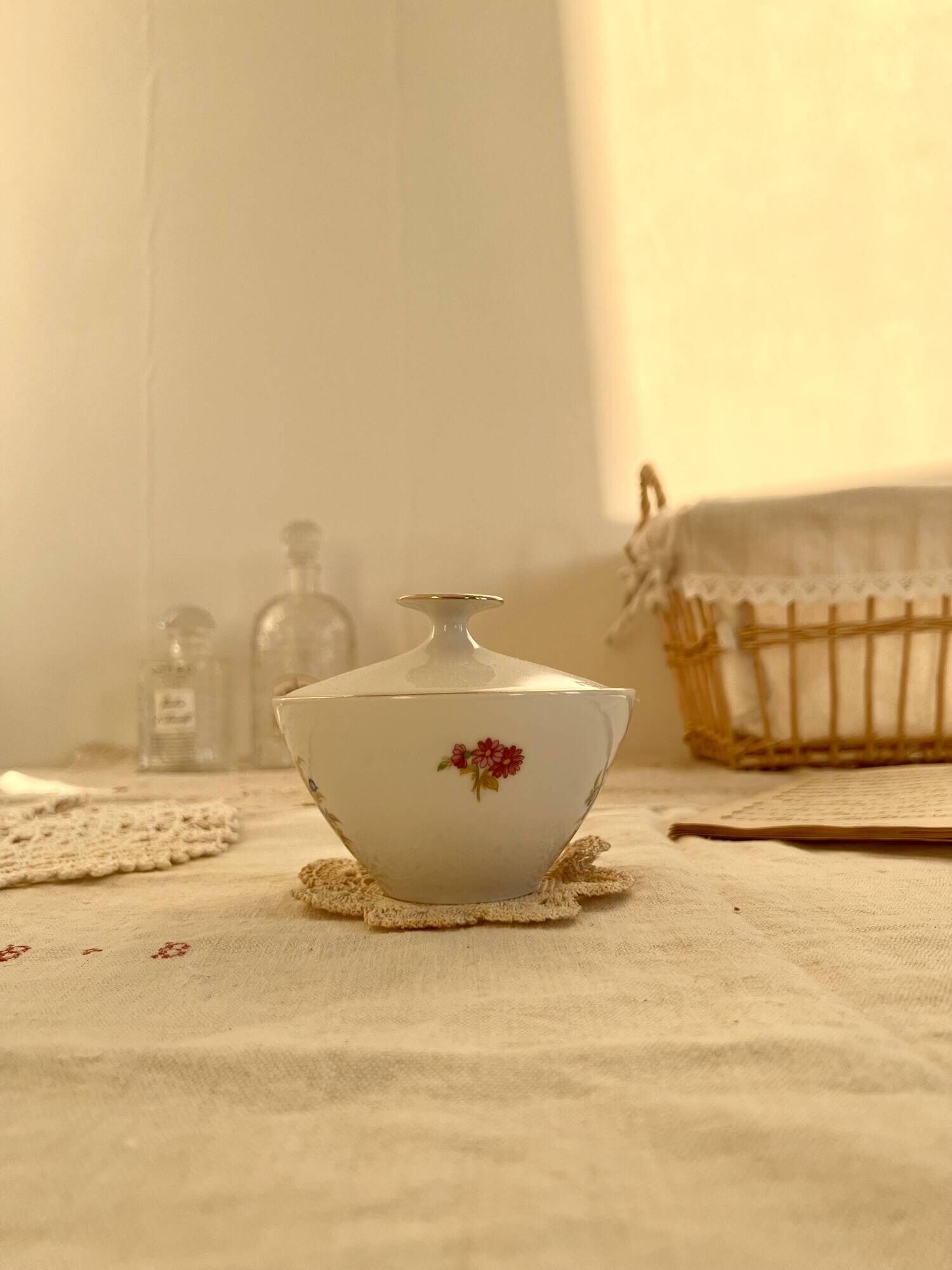 Vintage white porcelain sugar bowl and cottage core floral pattern