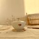 Vintage white porcelain sugar bowl and cottage core floral pattern