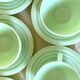 Art Deco cups in green opaline