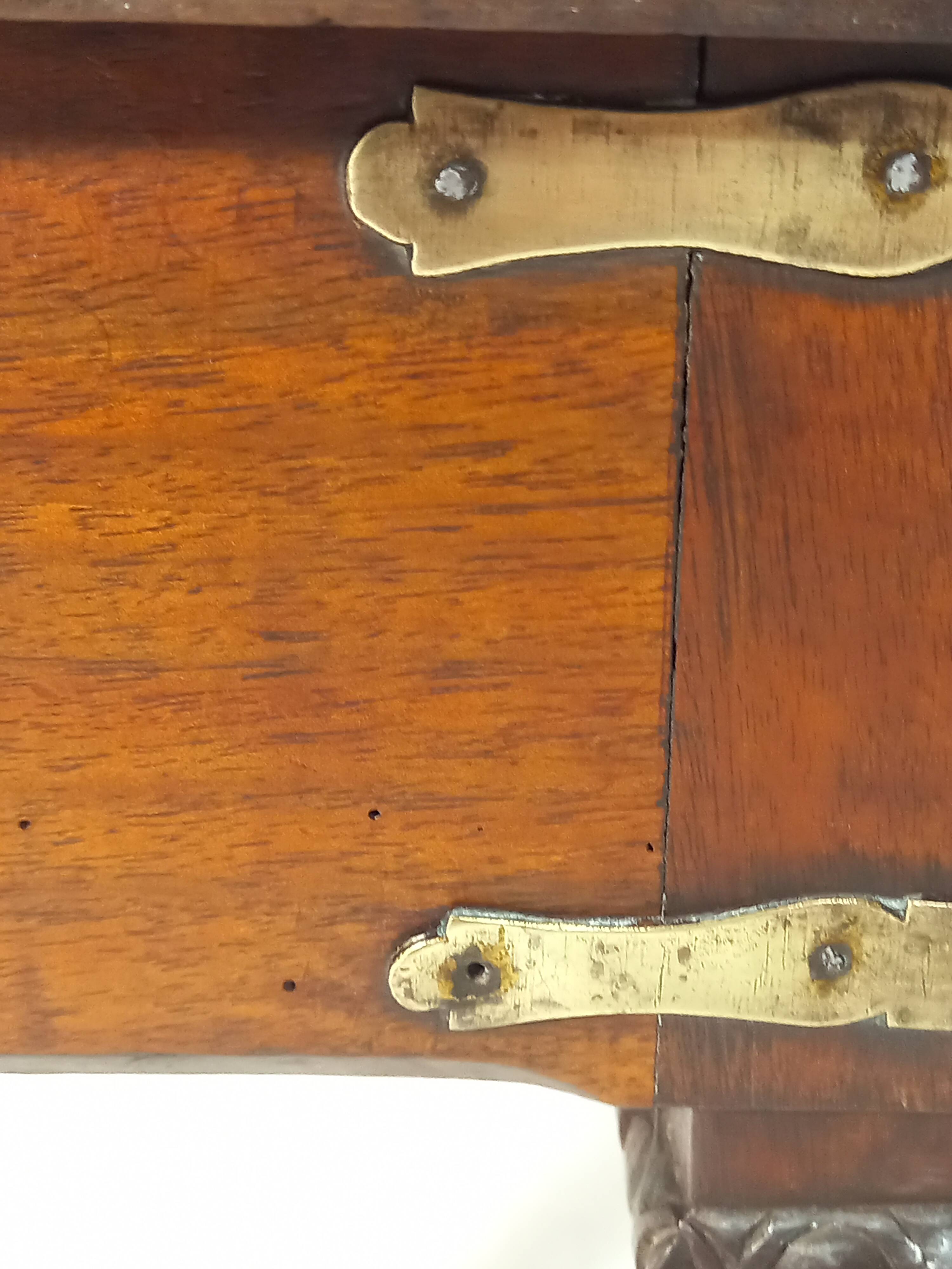 Small old side table with brass finishes