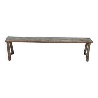 Old farmhouse bench in raw solid wood