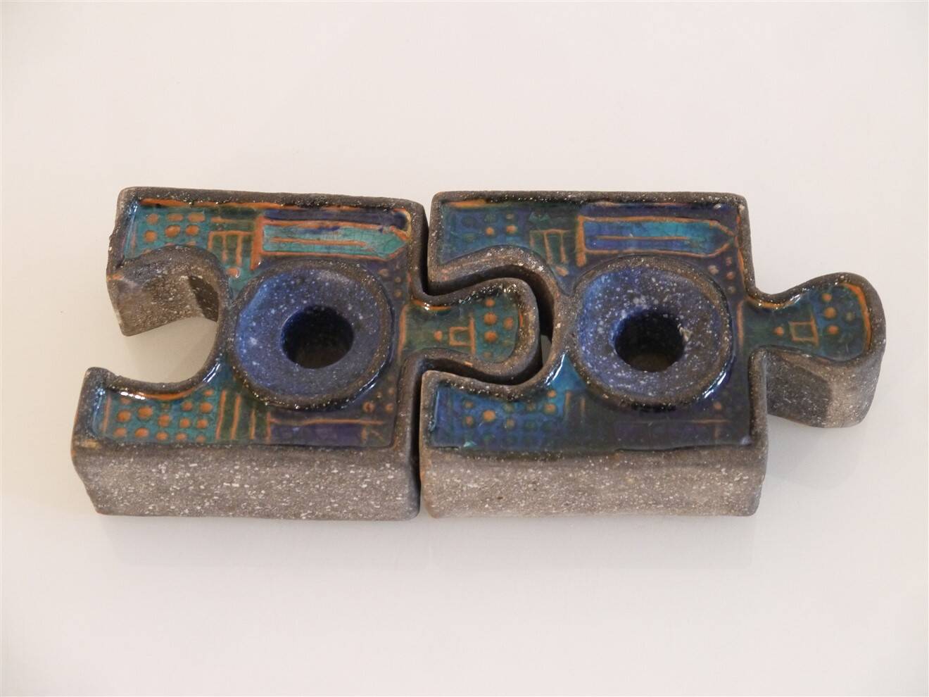Pair of ceramic candlesticks by Thomas Hellström for Nittsjo.