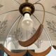 Scandinavian style glass and wood pendant light.