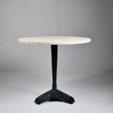 Vintage travertine bistro/dining table with metal base. (B)