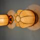 Pair of "cocoon" wall lights, polymer and pine, Italy, 1970