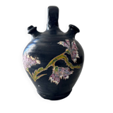 Black water jug with floral decoration