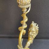 Old table lamp in bronze and brass gilded with satyr and snake