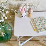 Small white rattan table