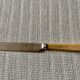 Antique silver-plated butter knife